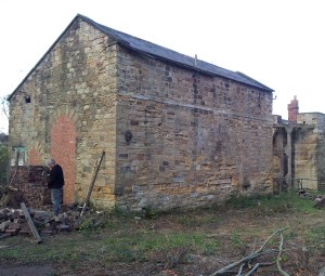 On brick reclamation duty as bricks emerge from other parts of the site being cleared of rubble.