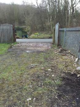 A view of the main site entrance, cleared of stumps and weeds