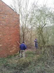 Volunteers clearing brambles at the lower level