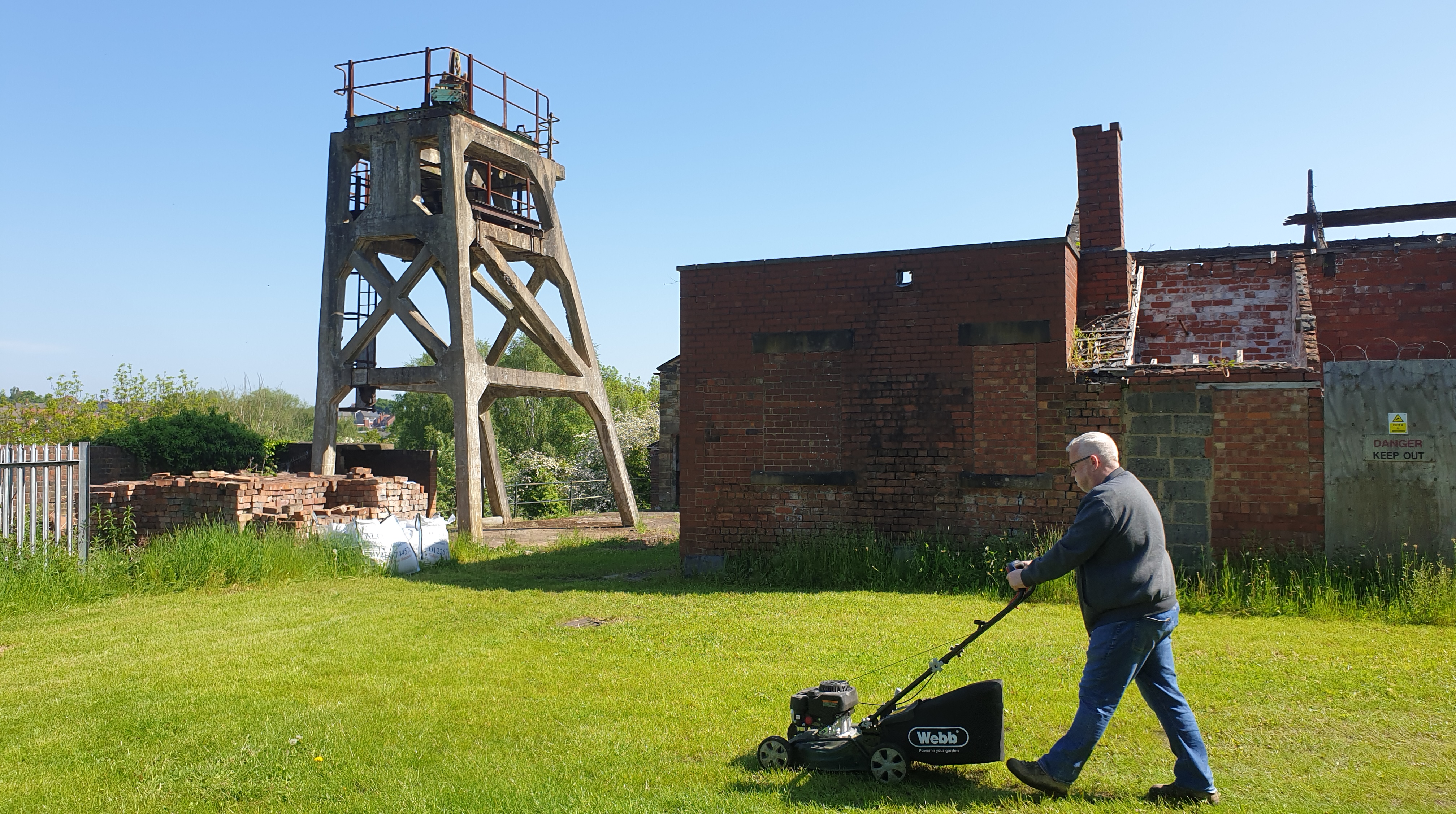 Site Manager glen mowing the grass 20th May 2023