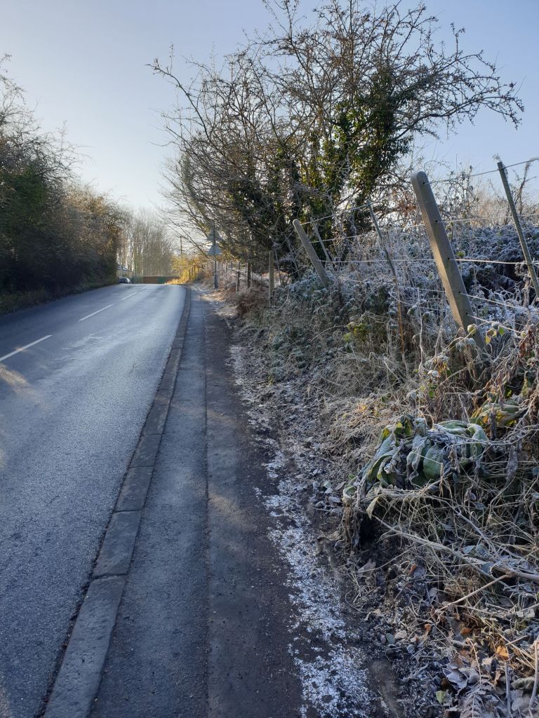 View from Tingle Bridge up Wath Road towards Hemingfield Colliery, showing the cleared pavement which had been much overgrown, cleared back by Barnsley Metropolitan Borough council in November 2023